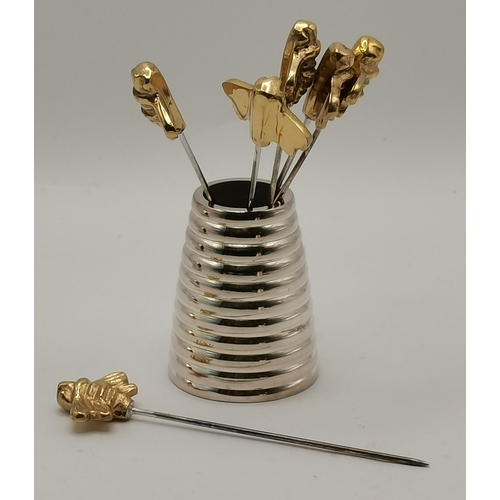 307 - A group of silver-plated 'Queen Bee' table items by Culinary Concepts, comprising a small domed circ... 