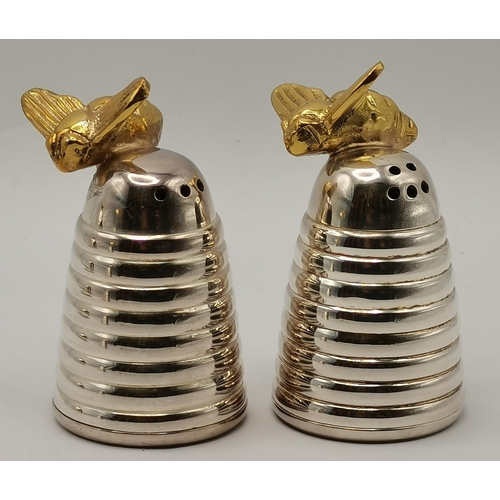 307 - A group of silver-plated 'Queen Bee' table items by Culinary Concepts, comprising a small domed circ... 