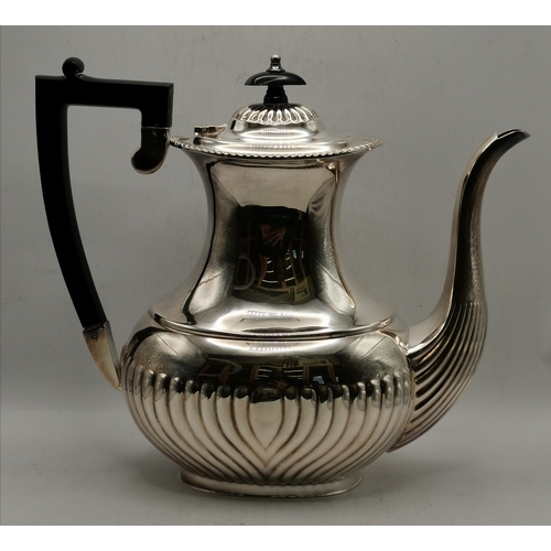 313 - A silver-plated four-piece tea and coffee service comprising teapot, coffee pot, cream and twin-hand... 