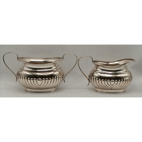 313 - A silver-plated four-piece tea and coffee service comprising teapot, coffee pot, cream and twin-hand... 