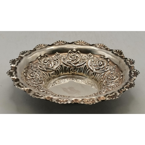 324 - An Edwardian silver dish by Fenton Brothers Ltd, Sheffield 1900, stepped circular, the sides heavily... 