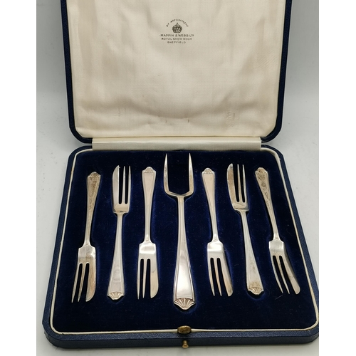 325 - A collection of silver and silver-plated flatware, comprising a set of six George V silver side kniv... 