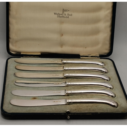 325 - A collection of silver and silver-plated flatware, comprising a set of six George V silver side kniv... 