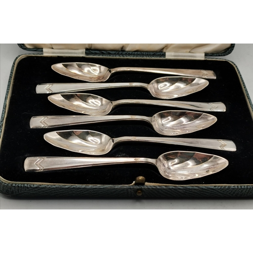 325 - A collection of silver and silver-plated flatware, comprising a set of six George V silver side kniv... 