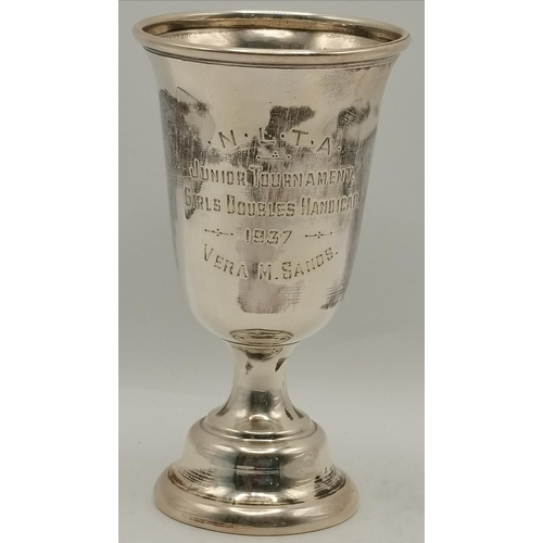 357 - A small group of mixed silver, 20th Century, comprising a George VI twin-handled trophy cup by Willi... 