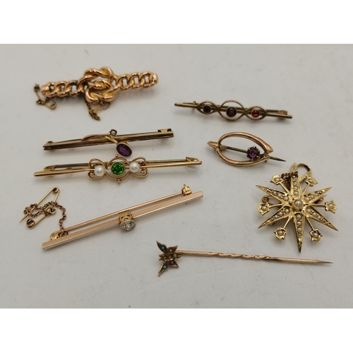 388 - A collection of gold and yellow metal jewellery, the 9 carat gold jewellery comprising two stick pin... 