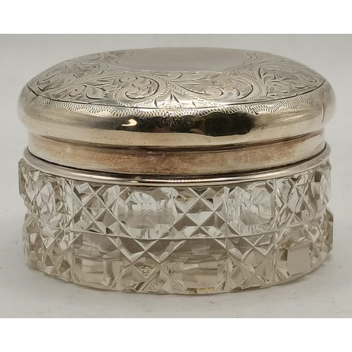 390 - A group of silver-mounted articles comprising an Edwardian silver bon-bon dish by Cornelius Desormea... 