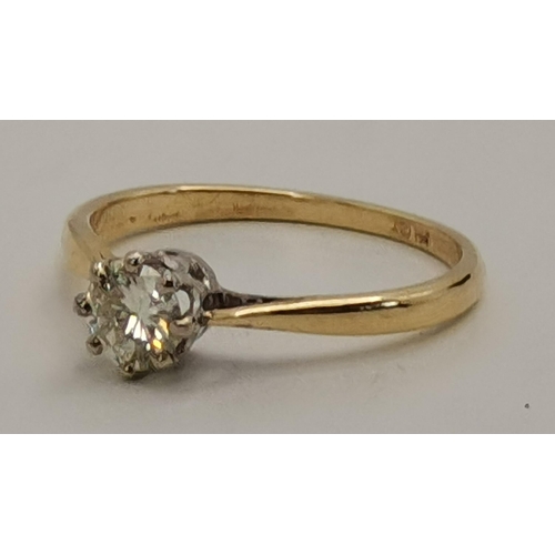 391 - An 18 carat gold solitaire diamond ring, the brilliant cut single stone in a white gold claw setting... 