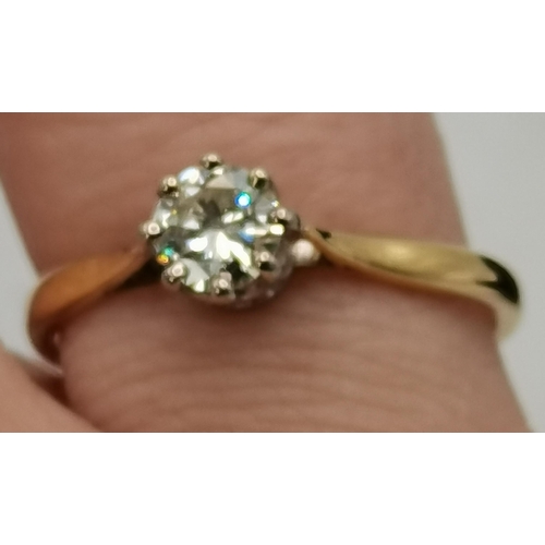 391 - An 18 carat gold solitaire diamond ring, the brilliant cut single stone in a white gold claw setting... 