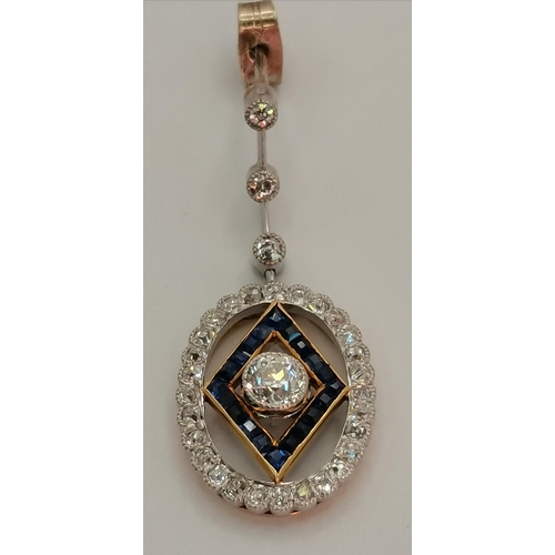 402 - A pair of Art Deco platinum and 18 carat gold diamond and sapphire pendant earrings, the oval pendan... 