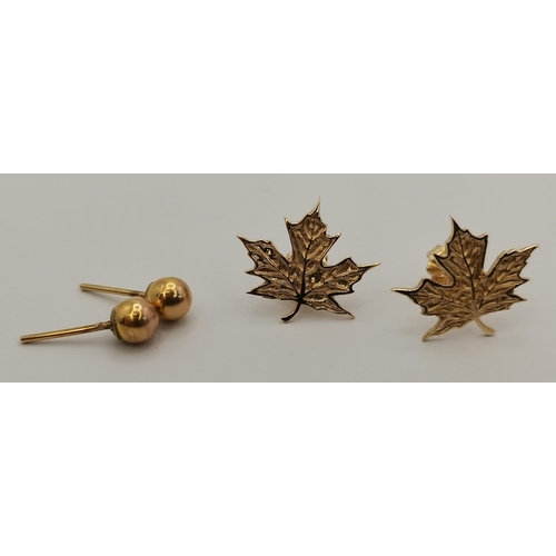 411 - Five pairs of stud earrings including a pair of 18 carat gold and white stone studs, stamped '750'; ... 