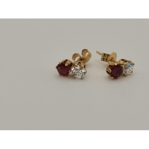 411 - Five pairs of stud earrings including a pair of 18 carat gold and white stone studs, stamped '750'; ... 