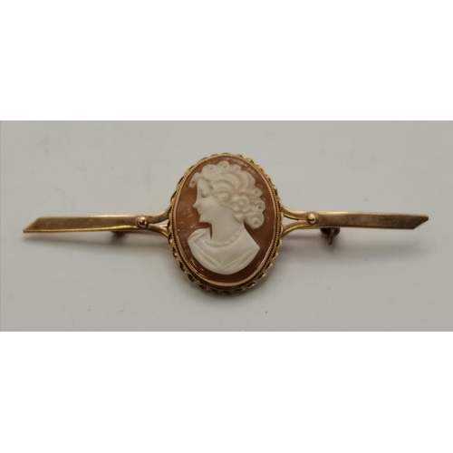 428 - Two Italian 9 carat gold mounted cameo brooches, the first oval with a female bust looking right, st... 