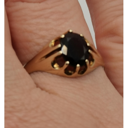 433 - A 9 carat gold garnet ring, a solitaire oval-cut garnet to a claw setting, hallmarked, ring size V; ... 