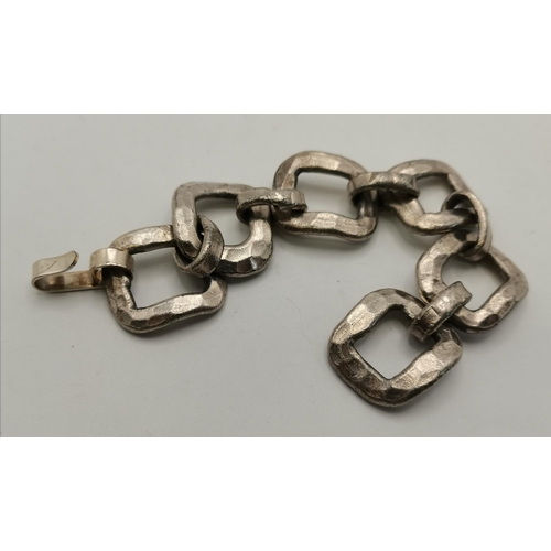 450D - A Danish mid-Century white-metal link bracelet by Eric Dennung for Buch & Deichmann, modernist style... 