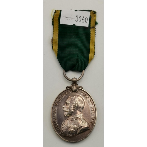 463 - Two medals comprising a George V Territorial Efficiency Medal to 1660548 GNR.A.HILTON. R.G.A.; and a... 