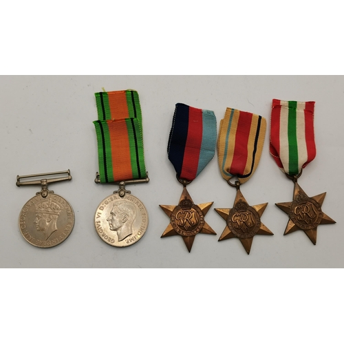 493 - A quantity of assorted WWI and WW2 medals, including a First World War trio to 1528 PTE.G.ADAMS. R.A... 