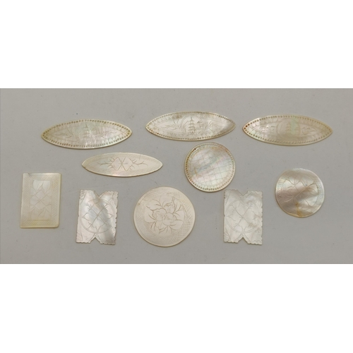 494 - A quantity of Chinese mother-of-pearl gaming tokens, assorted shapes, variously engraved. (Qty)