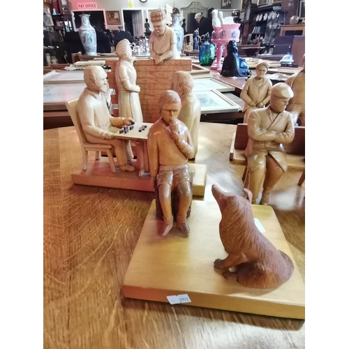 542 - A set of five carved figure groups of country people, in fruitwood, 25cm high