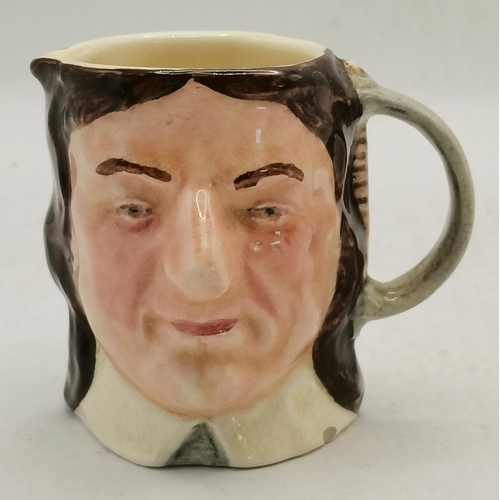 595 - A collection of Royal Doulton character / toby jugs plus others .