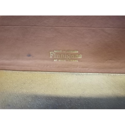 603 - An antique tan leather suitcase, by Finnigans of Bond Street, leather lined, gilt-stamped 'FINNIGANS... 