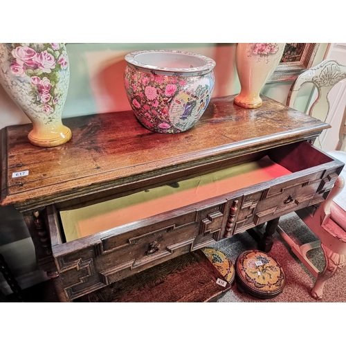 617 - A Titchmarsh and Goodwin style oak serving table, with large single drawer. 102cm wide x 45cm deep