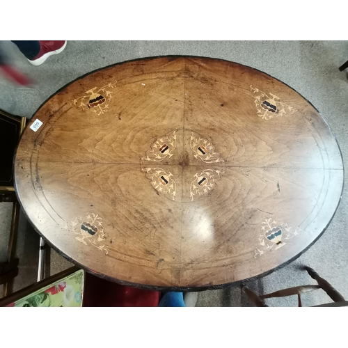 660 - A Victorian walnut with marquetry inlay breakfast / loo table