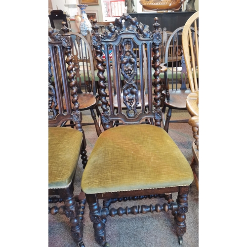 679 - Antique Oak Carved High Backed chairs on castors