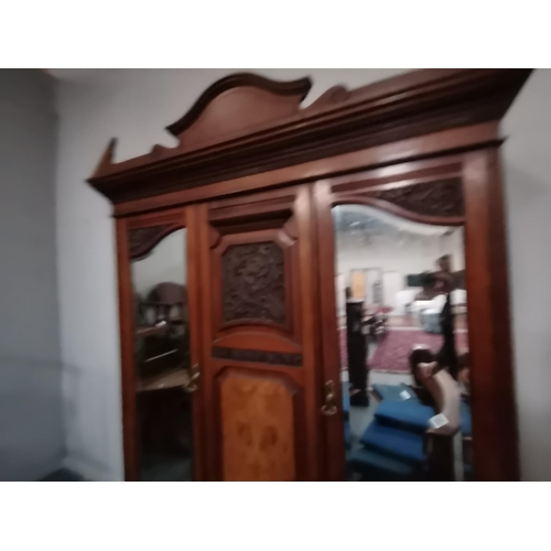 876 - A Victorian mahogany and walnut double wardrobe and a matching dressing table