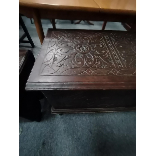 877 - An early oak carved blanket box on legs 1m x 40cm