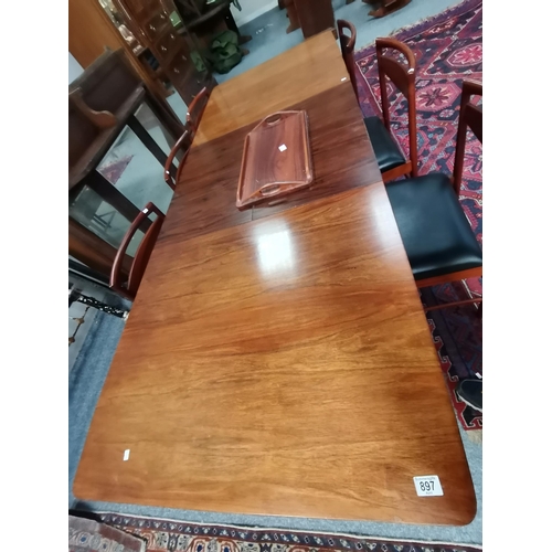 897 - A.H.McIntosh & Co Ltd: A mid-century rosewood extending dining table and six chairs, the table with ... 