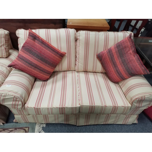 930b - x2 two seater sofas in cream with red stripes - W150cm