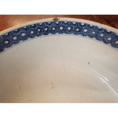 519 - An early Chinese bowl with decorative floral and characters. 27cm diameter