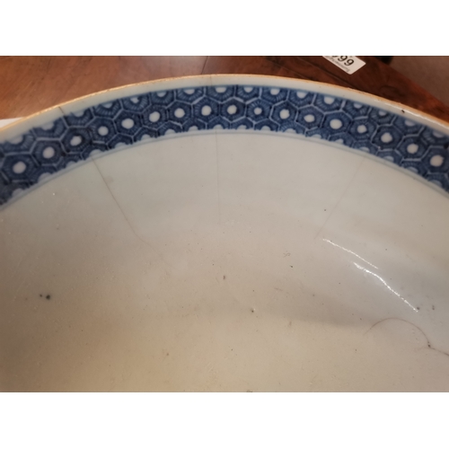 519 - An early Chinese bowl with decorative floral and characters. 27cm diameter