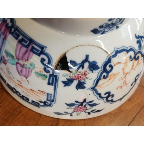 519 - An early Chinese bowl with decorative floral and characters. 27cm diameter