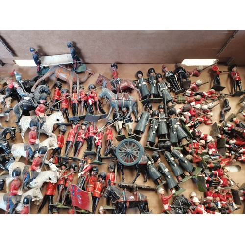 294 - Quantity of vintage lead toy soldiers with original boxes 