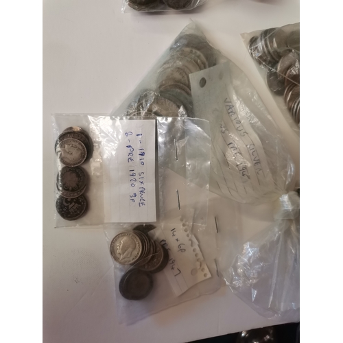 457 - A quantity of mixed coinage, mostly British, including some pre-1947 silver. (One box)