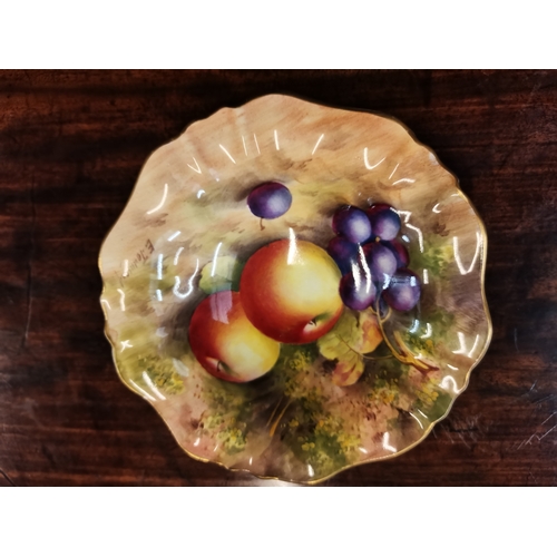 230P - A Royal Worcester small dish by Edward Townsend, date code 1936, painted with fruit, signed. 14cm di... 