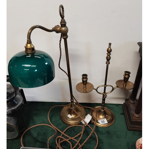 60 - A vintage brass extending desk lamp with green shade plus a brass candlestick