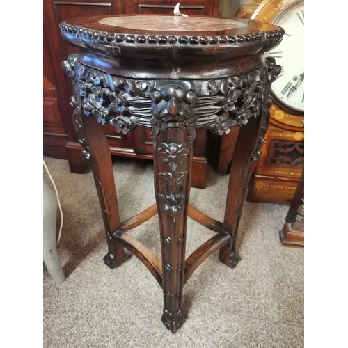 629 - A 60cm high Antique rosewood pot stand with highly decorative floral decoration