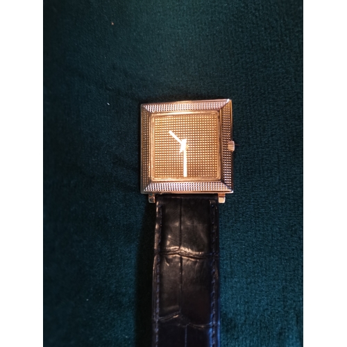 490 - An 18 carat gold Boucheron 'Carrée' wristwatch with Patek Philippe movement, the gold square dial an... 