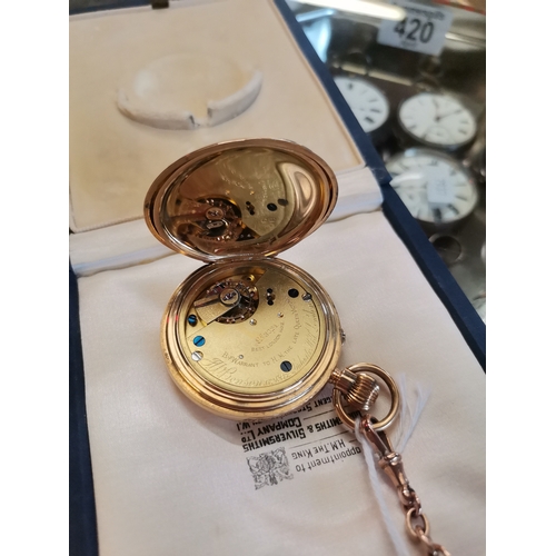 422 - An 18 carat gold half hunter pocket watch, the cream enamel dial signed J W Benson London, with Roma... 