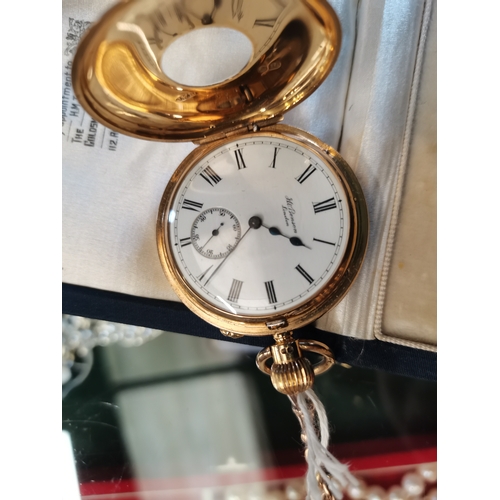 422 - An 18 carat gold half hunter pocket watch, the cream enamel dial signed J W Benson London, with Roma... 