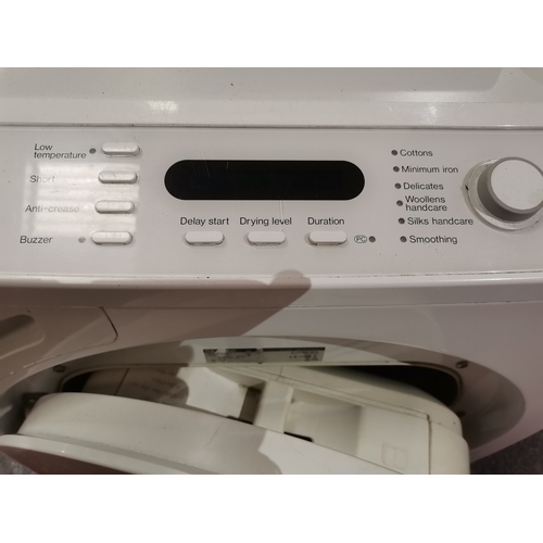 905 - A Miele tumble dryer, Honeycomb Care T9246C. 83.5cm high, 59.3cm wide