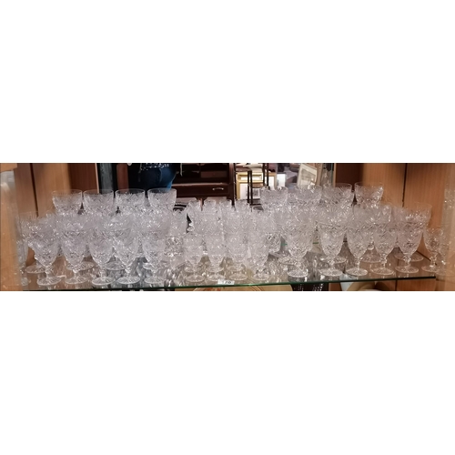 170 - A comprehensive suite of crystal glasses including wines glasses, tumblers etc