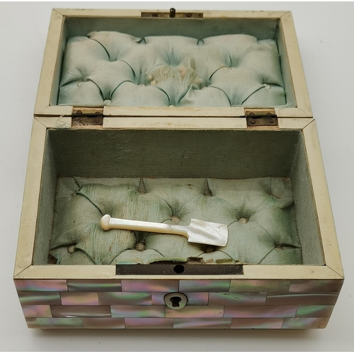 194 - A mother-of-pearl jewellery box, rectangular, with pale blue silk deep-buttoned interior. Approx. 7.... 