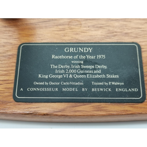 200 - A Beswick Connoisseur racehorse model, 'Grundy', on an oval wooden base with name plaque; together w... 