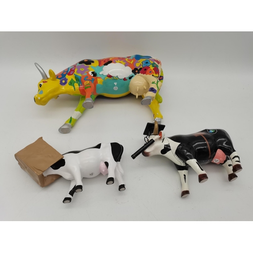 206 - 3 x Cow Parade figures.... COW HIDE , COW DOUTURA AND GROOVY MOO all in excellent condition and with... 