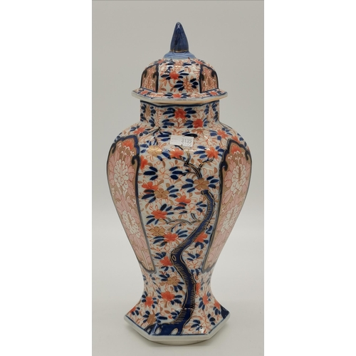 219 - A Japanese Imari porcelain jar with cover, and a matching vase, both hexagonal baluster. (2) Jar 30.... 