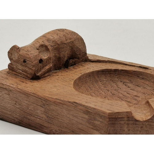 231 - Robert Thompson, a Mouseman oak ashtray, of typical form, with carved mouse signature. 10.1cm by 7.6... 